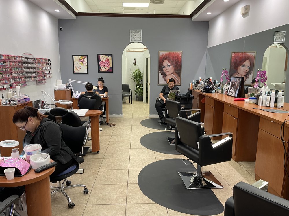 Hair styling chairs and nail stations inside Tiptop Hair Designs